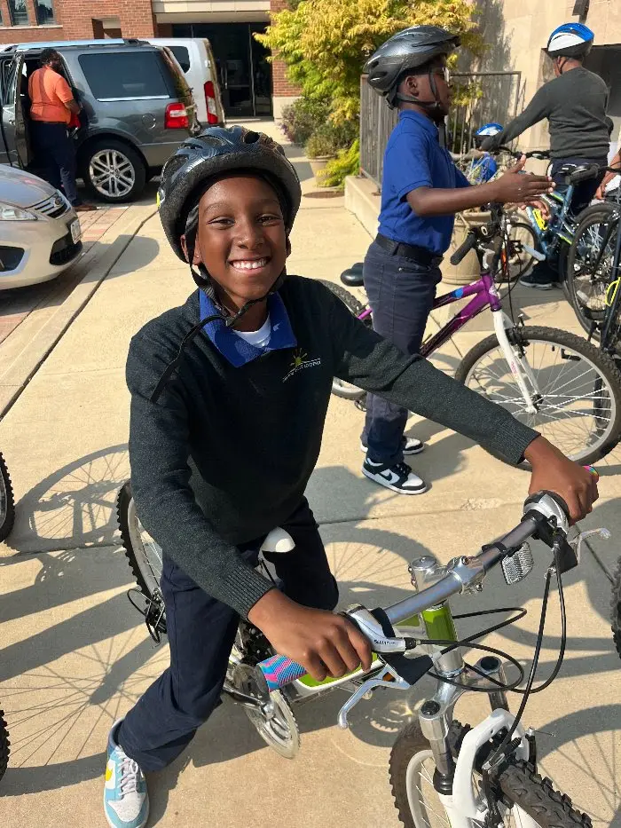 CJA Student on Bike