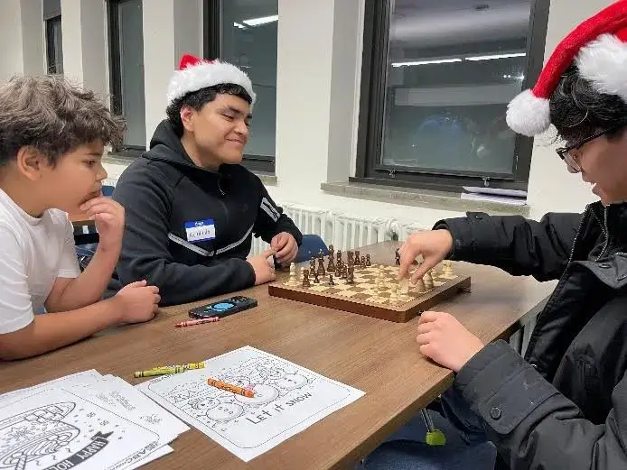 CJA students playing chess